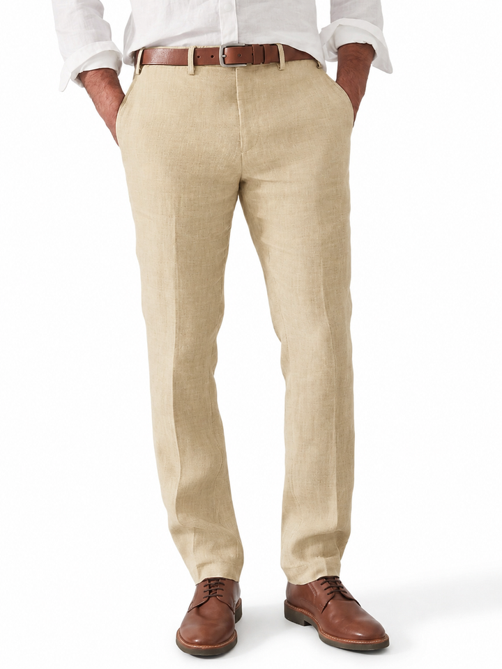 Men's linen pants in sand beige with a brown leather belt, front view
