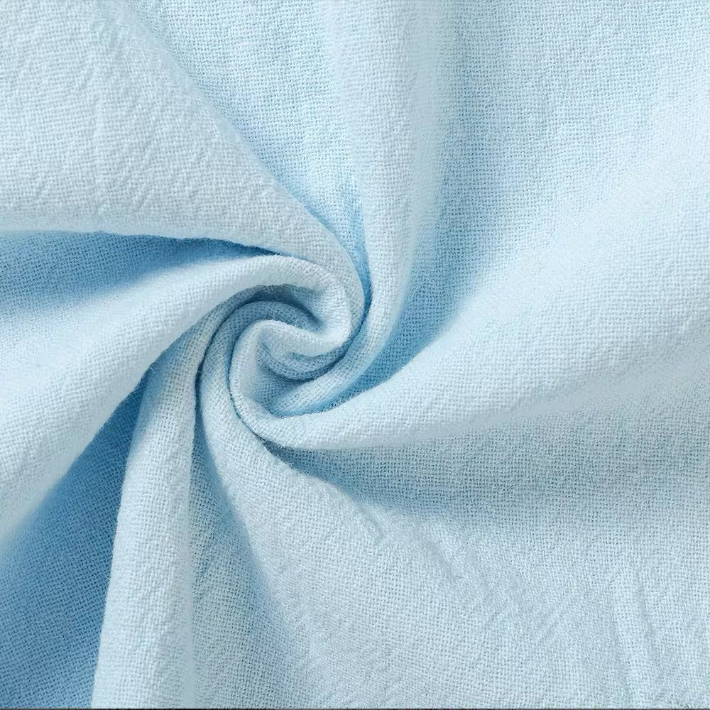 Light blue woven fabric with a crinkled linen-like texture.
