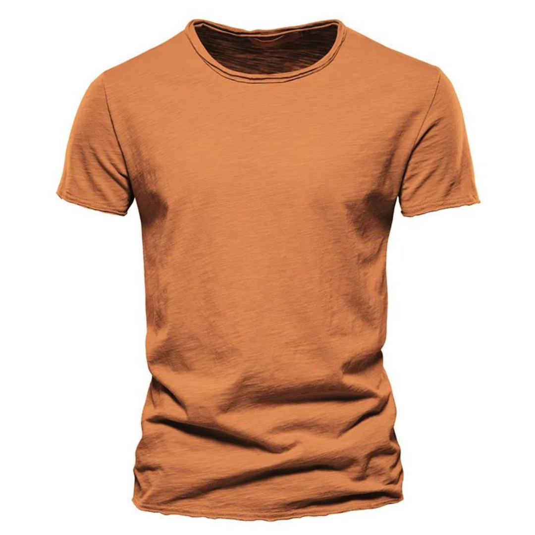 Men's short-sleeve crew neck tee in burnt orange with slub texture and raw-edge hems.