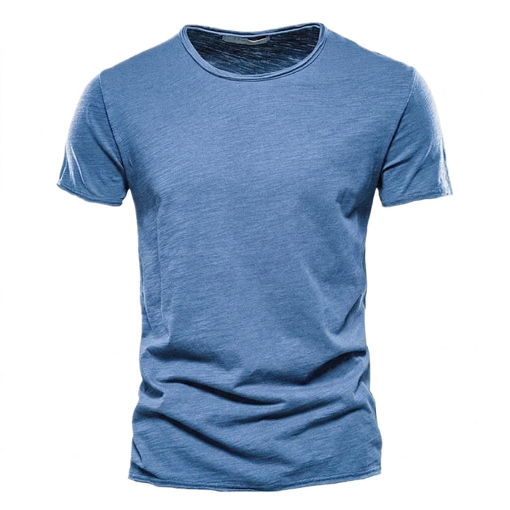Men's short-sleeve crew neck tee in medium blue with visible slub texture and raw-edge hems.