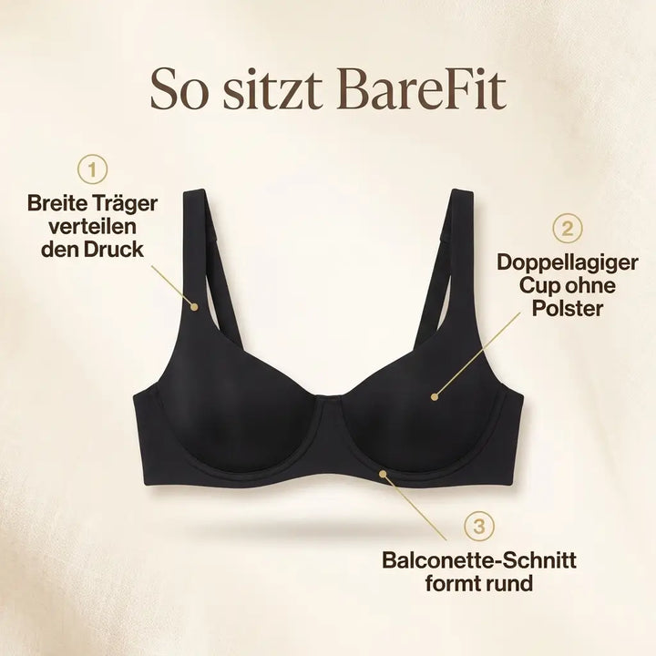 Black balconette bra laid flat showing the wide straps and double-layer cup detail.