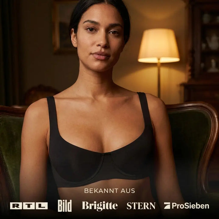 Black balconette bra with wide straps shown in another view.
