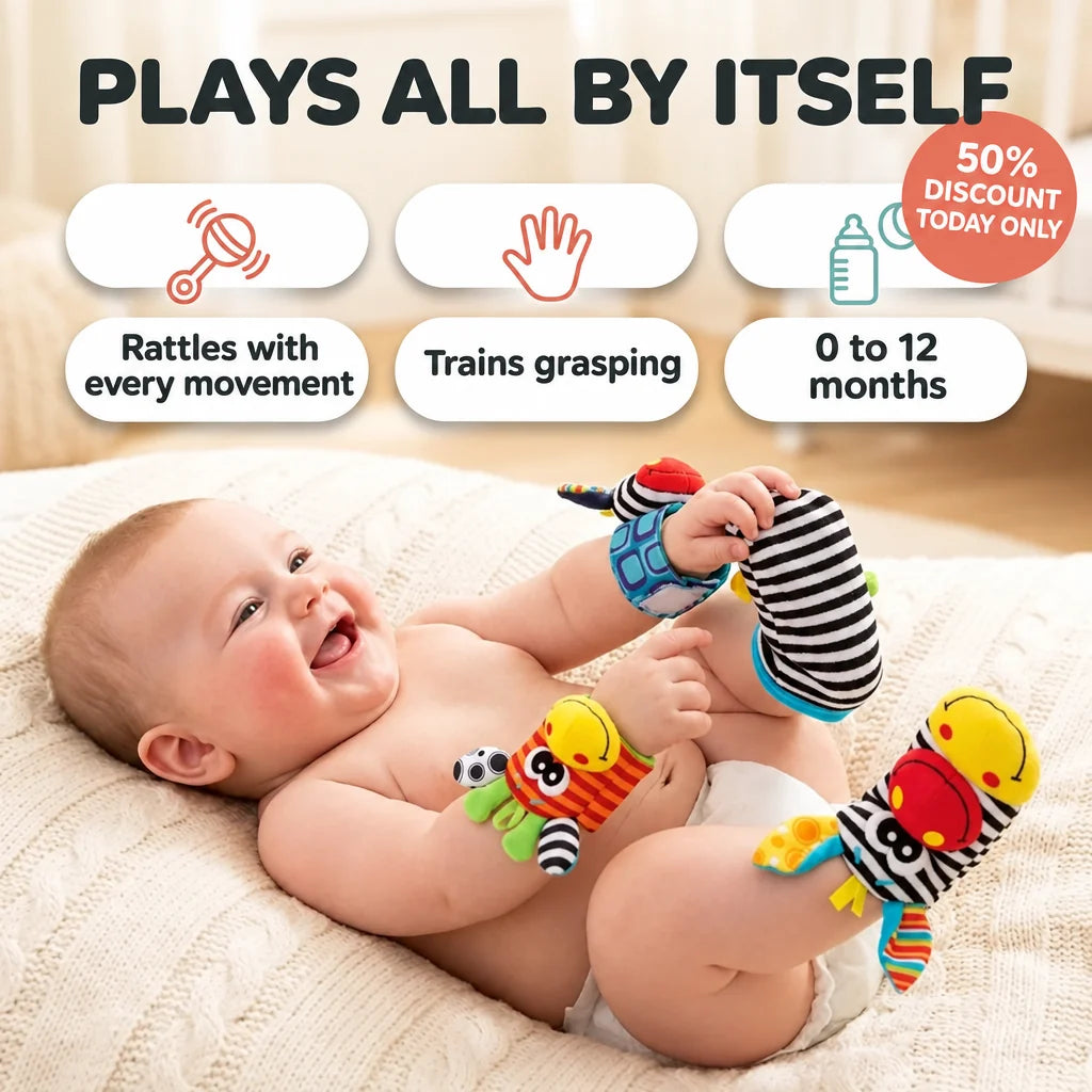 Baby wearing the striped zebra and giraffe wrist rattles and foot socks on a cream knit blanket.
