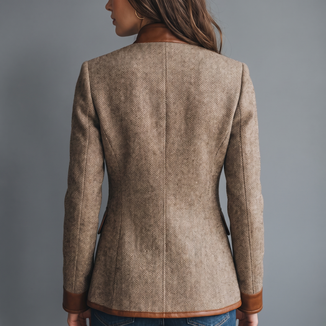 Back view on a model, showing the center seam, tweed back and leather-look hem and cuffs 3