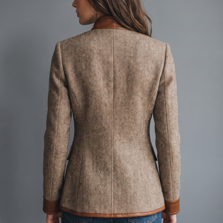 Back view on a model, showing the center seam, tweed back and leather-look hem and cuffs 3