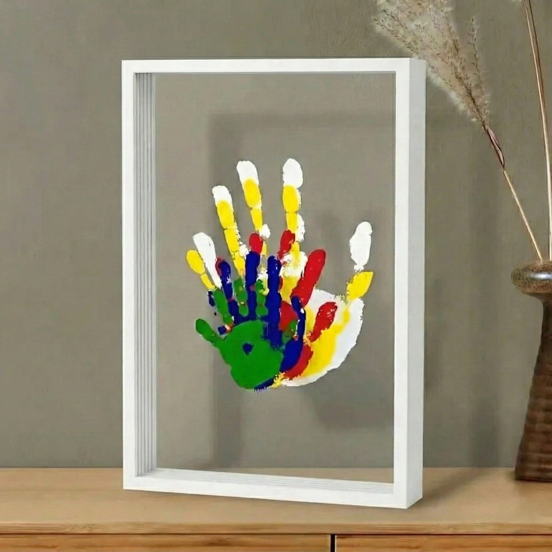 Family Handprint Keepsake Kit with Frame in a white frame with clear panels and overlapping handprints