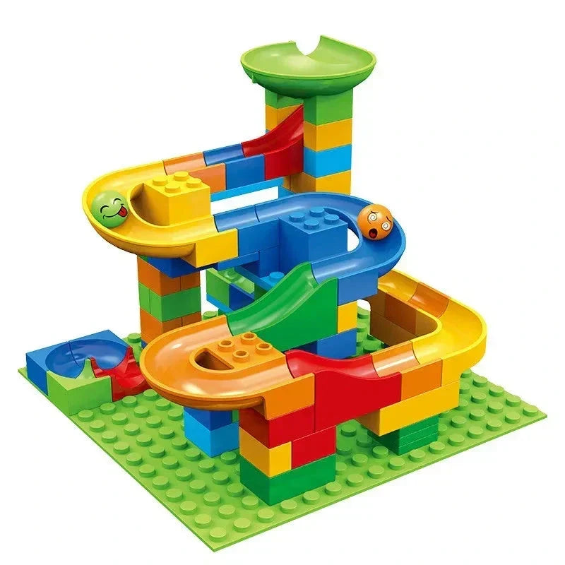 Small starter marble run with a green funnel on top and winding yellow, blue and orange tracks on a green baseplate.