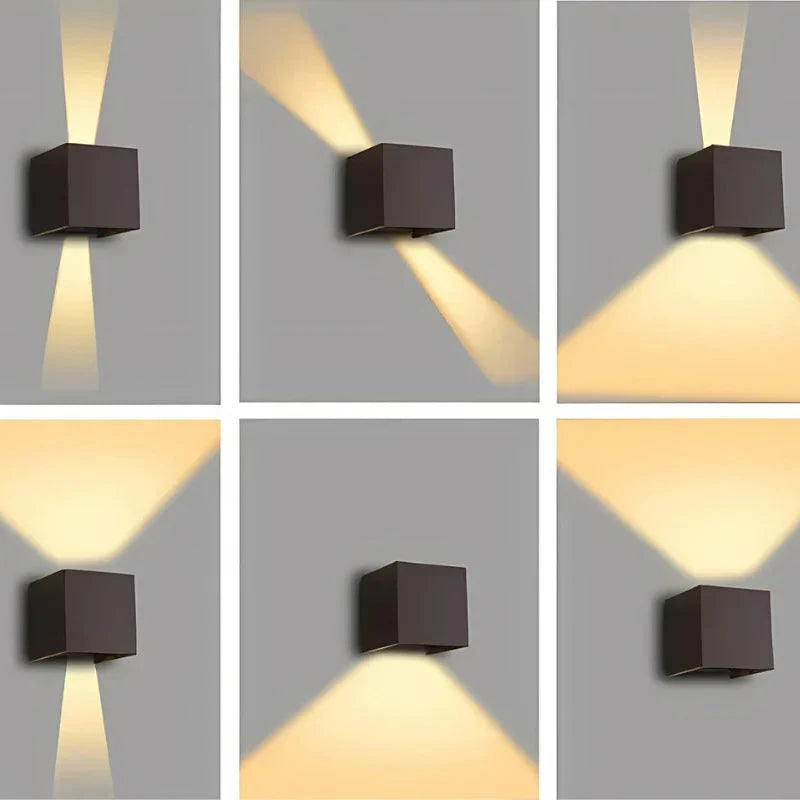 Six panels showing a dark cube wall lamp with different light beam angles, from narrow up-and-down to wide and tilted. 14