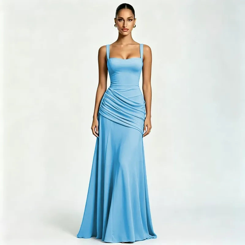 Model in a light blue maxi dress with square neckline, wide straps and gathered waist drape