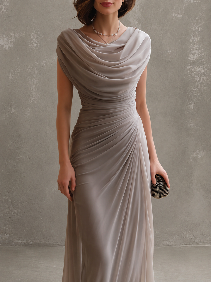 Taupe dress bodice detail showing the draped neckline and ruching at the waist.