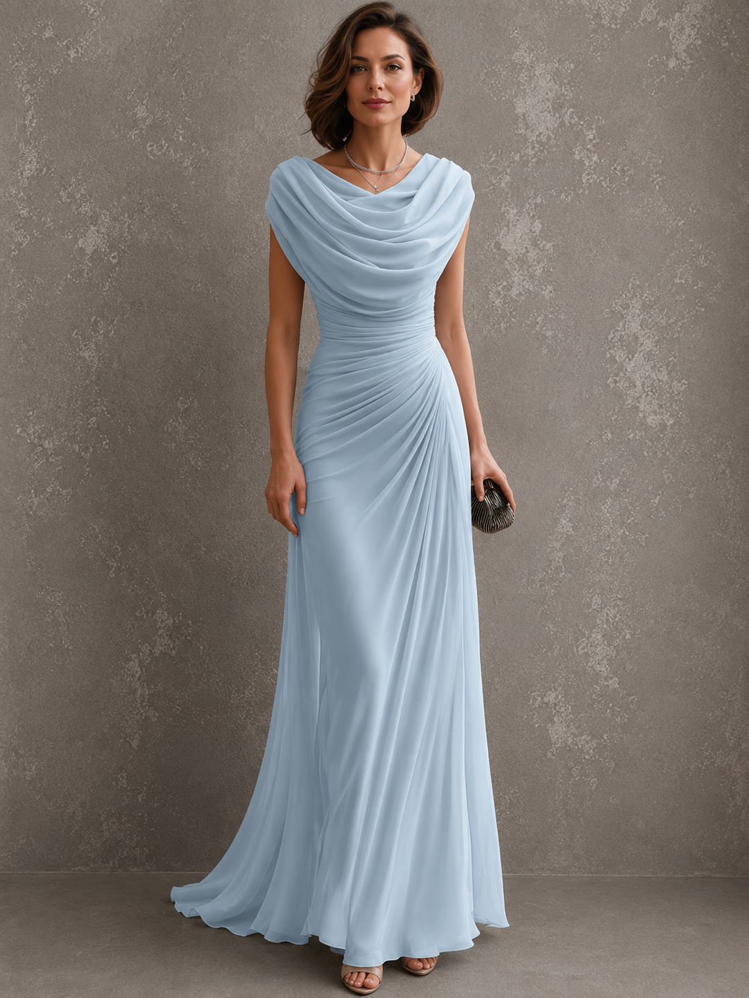 Model in the beige dress, with draped cowl neckline, ruched waist and floor-length skirt.
