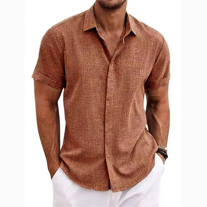 Men's Short-Sleeve Textured Linen Shirt in rust brown, detail of cuffed short sleeves and a visible weave.