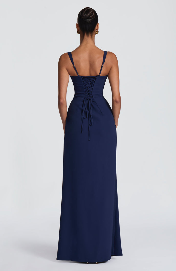 Navy Camille Maxi Dress back view with corset lace-up back and thin adjustable straps.