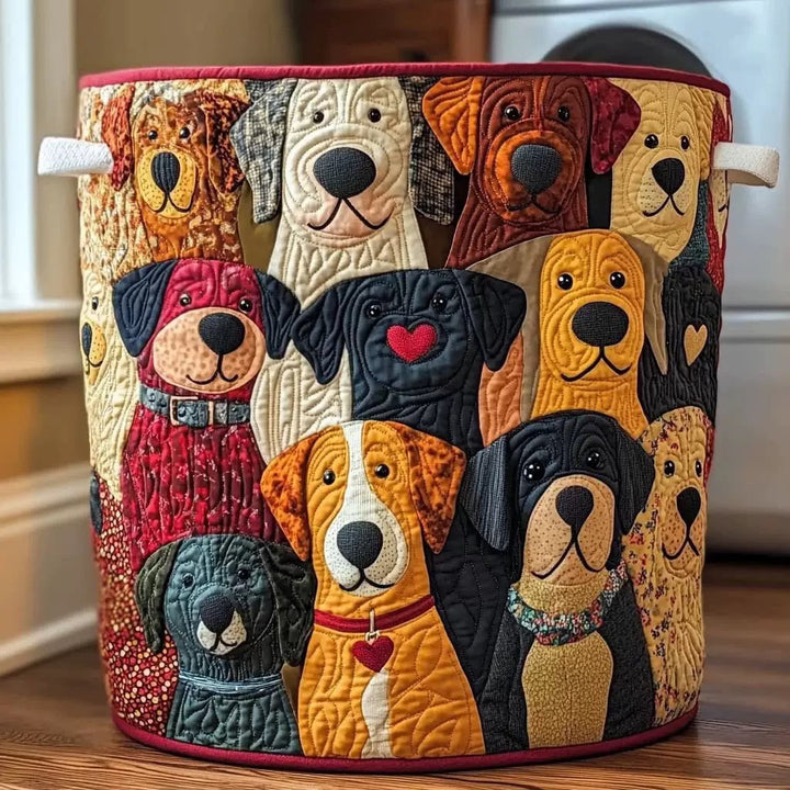 Round quilted hamper covered in appliqué dogs of many colors, with cream handles and a red trim, standing on a wood floor. 1