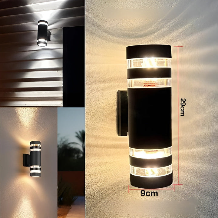 LED Outdoor Wall Light in black with clear striped bands and a height and width measurement diagram.
