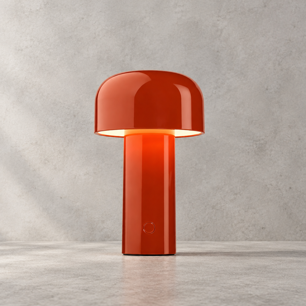 Glossy red lamp with round touch button on the stem, glowing under its dome shade 29