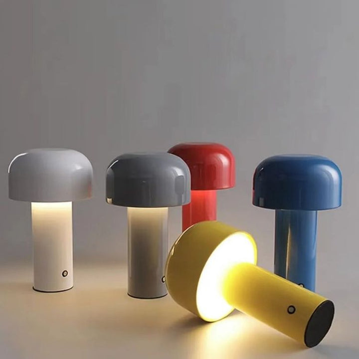 Five lamps in white, gray, red, blue and yellow, with the yellow one lying on its side, lit 18