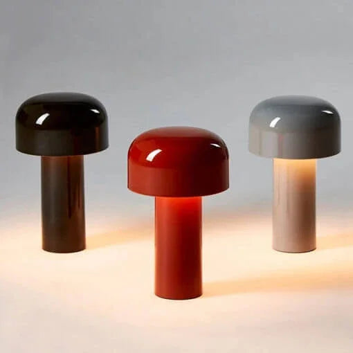 Three mushroom lamps in dark brown, red and light gray, each glowing softly side by side 25