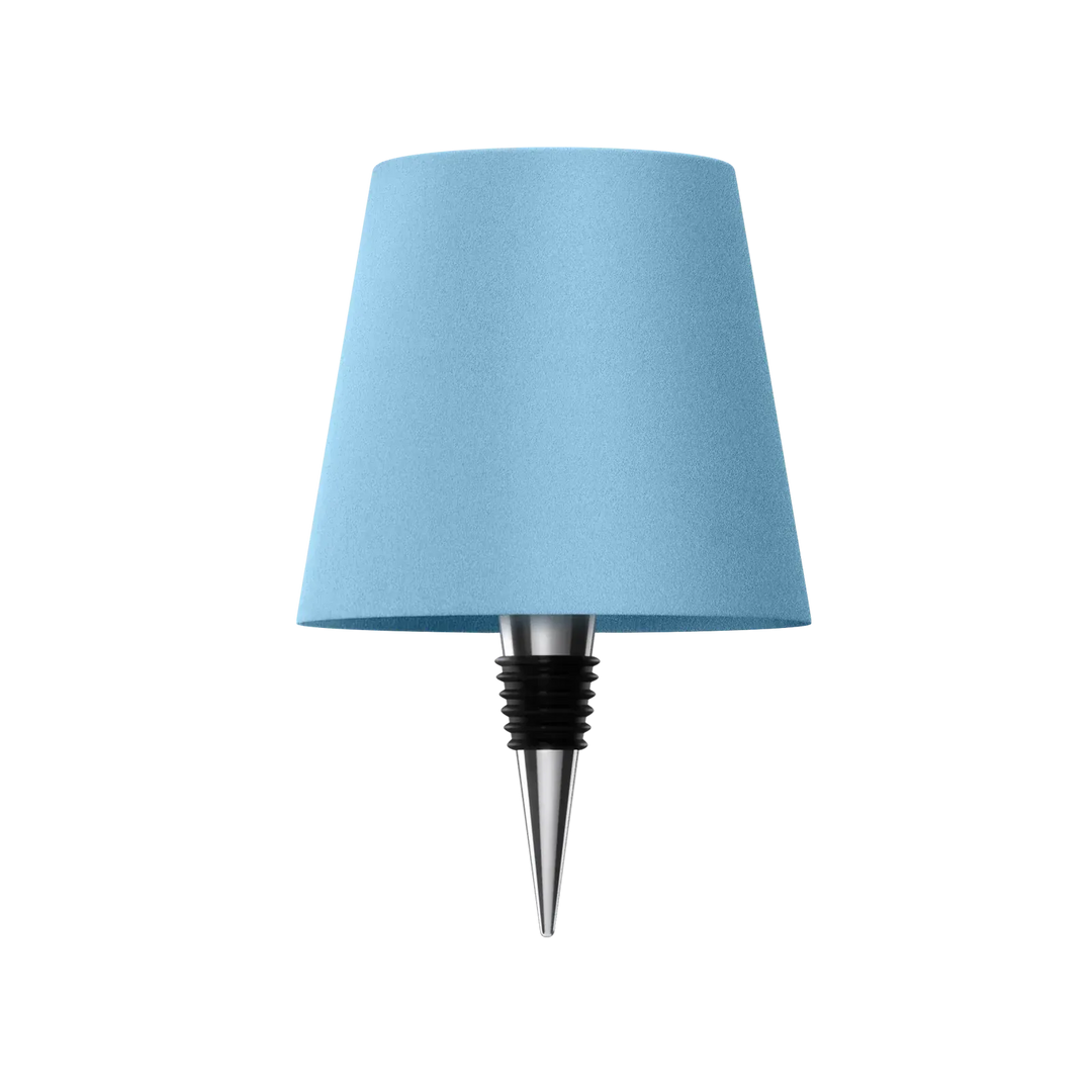 Light blue bottle lamp with a chrome and black rubber bottle stopper on a white background.