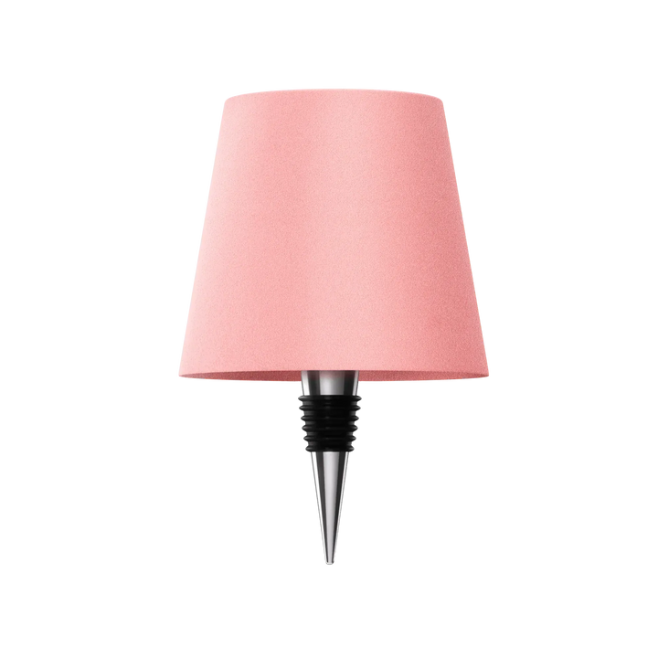 Pink bottle lamp with a chrome and black rubber bottle stopper on a white background.