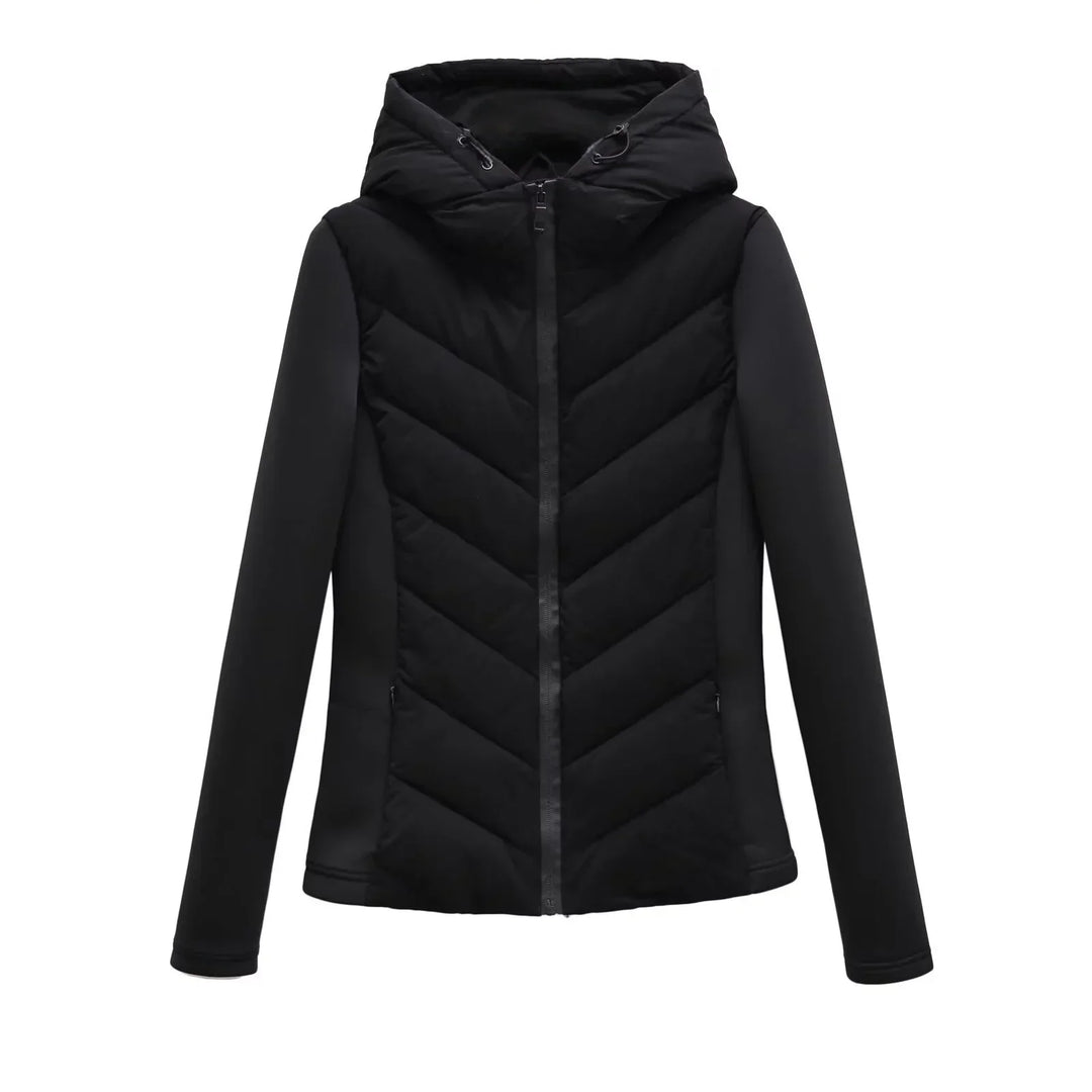 Women's black hooded padded winter jacket detail with chevron quilting and zippered side pockets.