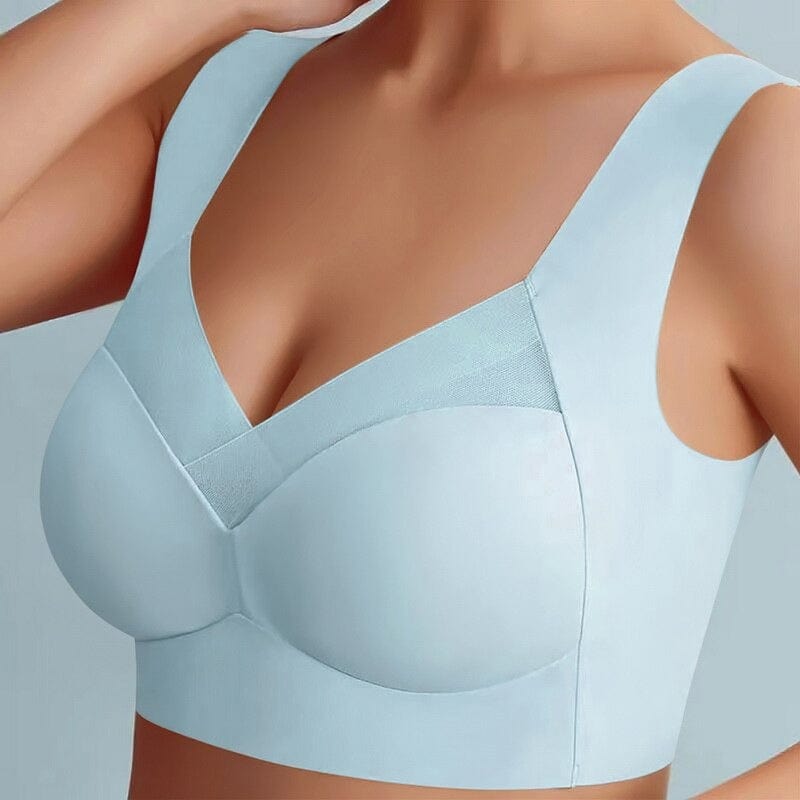 Light blue seamless bra detail showing smooth cups, mesh neckline, and wide straps.