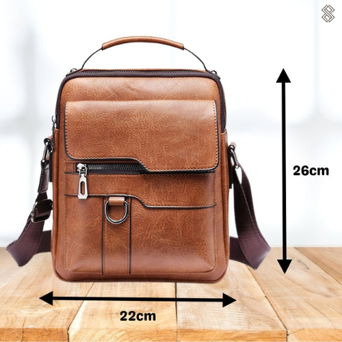 Front of the brown shoulder bag with arrows marking its height and width dimensions.