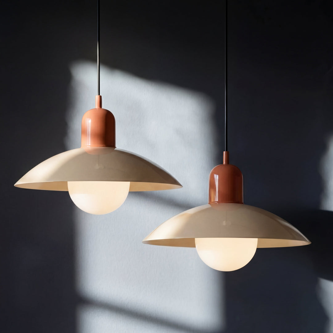 Two beige Macaron Pendant Light fixtures side by side against a dark wall.