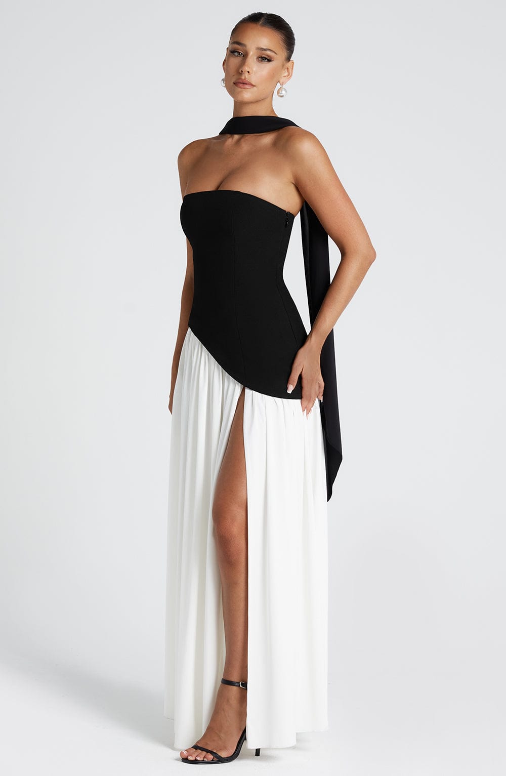 Another view of the black and white dress with black strapless bodice, black scarf and white gathered skirt.