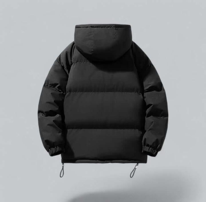 Black quilted puffer jacket with hood, back view, showing horizontal quilted panels, elastic cuffs and drawcord toggles at the hem