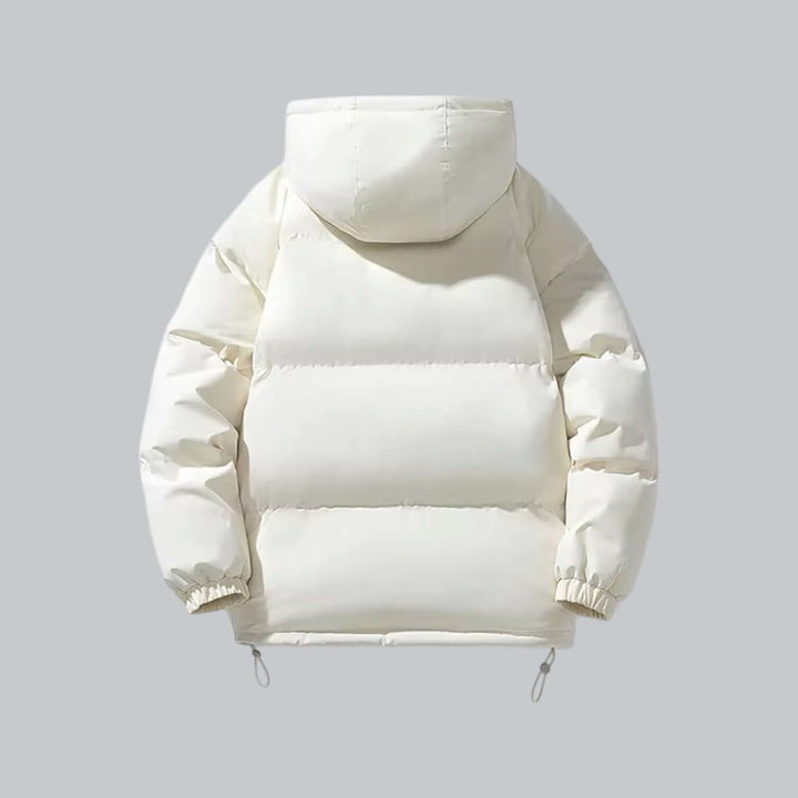 Cream white puffer jacket with hood, back view, showing wide quilted panels and drawcord toggles at the bottom hem