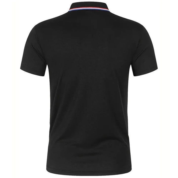 Back view of the black short-sleeve polo shirt, showing a plain back and the striped collar from behind. 10