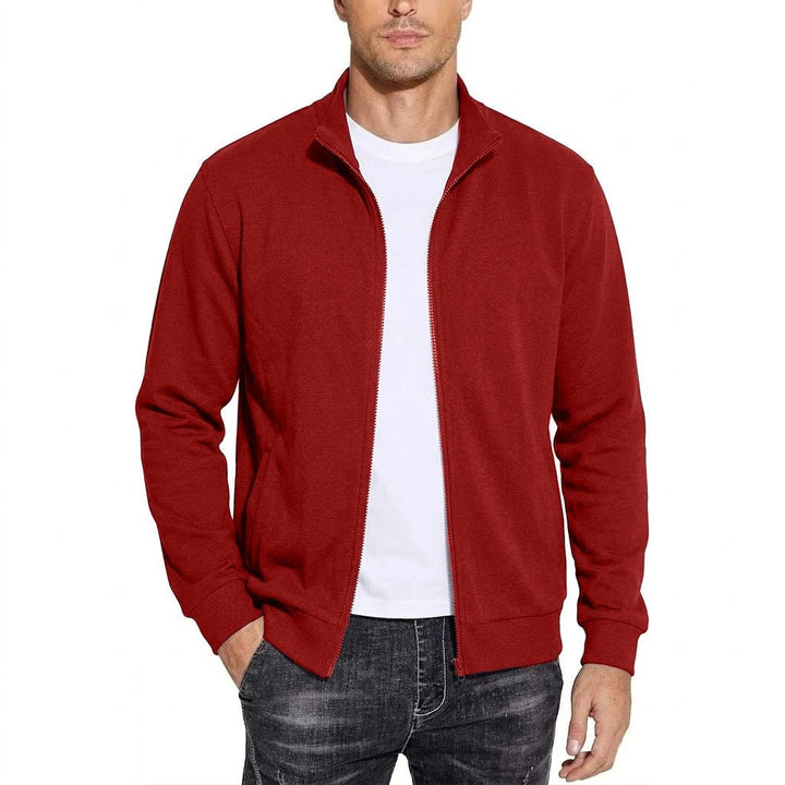 Red version worn open over a white tee and dark jeans, front view with one hand in the side pocket. 4