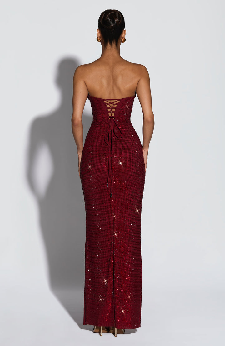 Back view of the burgundy dress showing the lace-up corset back with long hanging ties 2