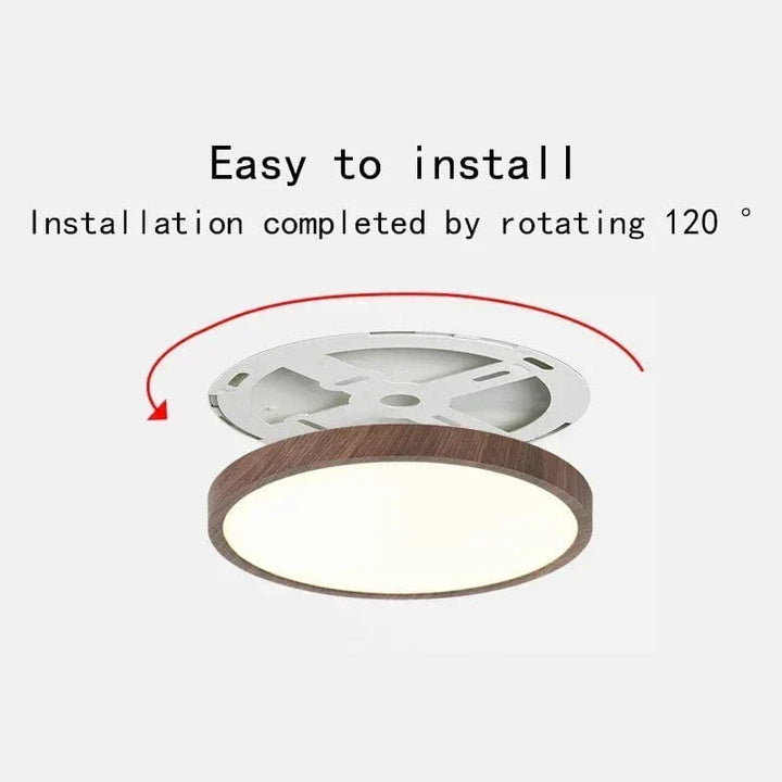 Walnut-finish round ceiling light with its white mounting plate, shown tilted below it.
