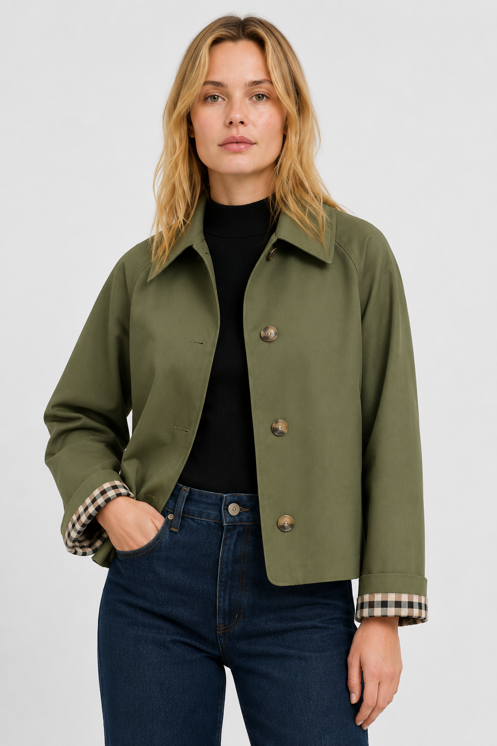Women's olive green lightweight jacket with gingham cuff lining, front close-up.