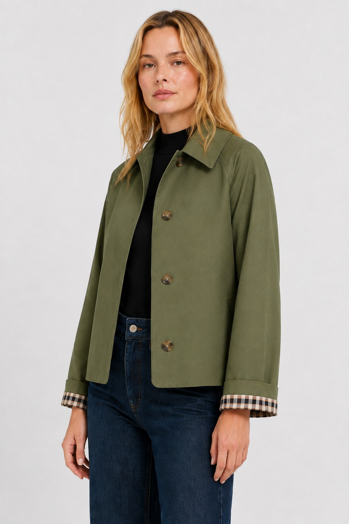 Women's olive green lightweight jacket, another view with buttoned front and checked cuff lining.