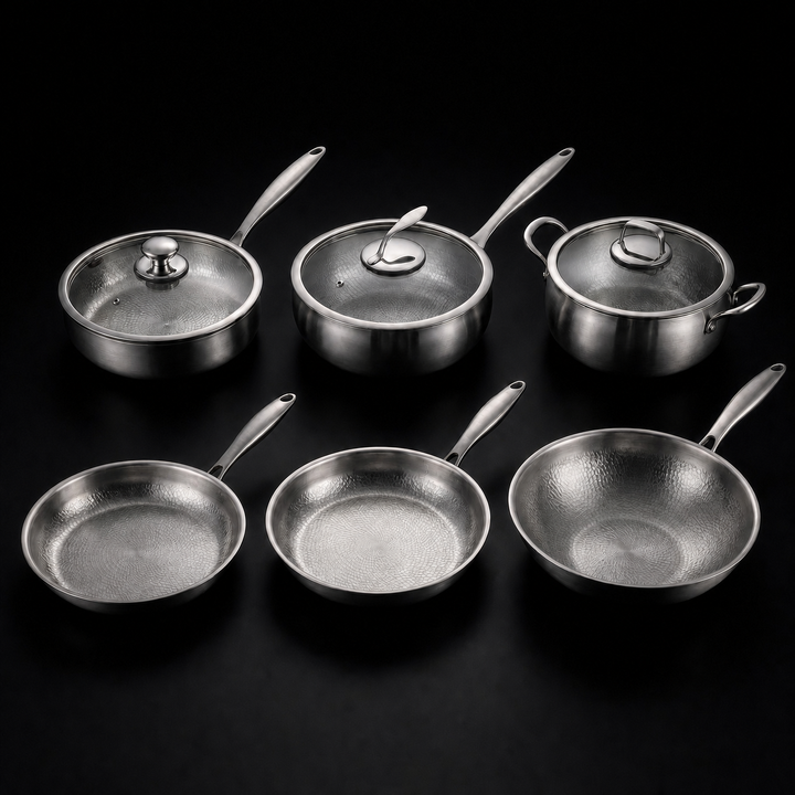 Hand-Hammered Titanium Kitchen Set with 3 Lids in silver, three lidded pots and pans and three open pieces