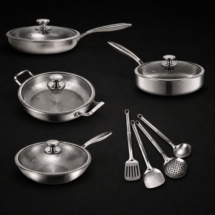 Four pans with glass lids and steel knobs beside the four utensils on a black background.