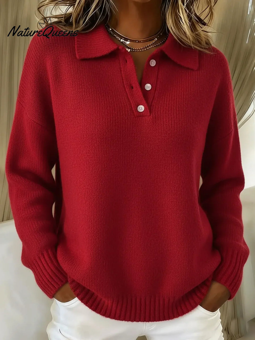 Red polo sweater with ribbed cuffs and hem and a three-button neckline.