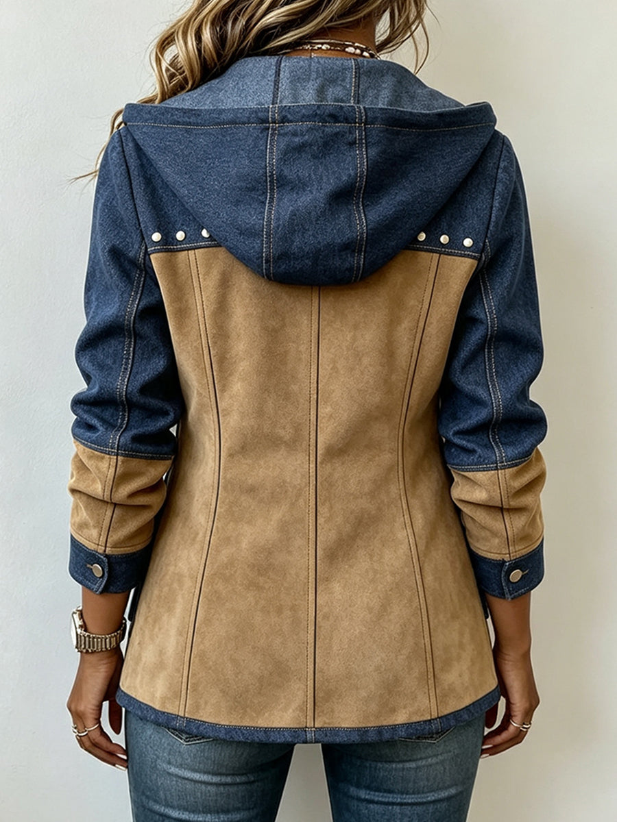 Back view of the jacket on a model, showing the denim hood, studded shoulders, tan suede back panel and denim sleeves with button cuffs. 2