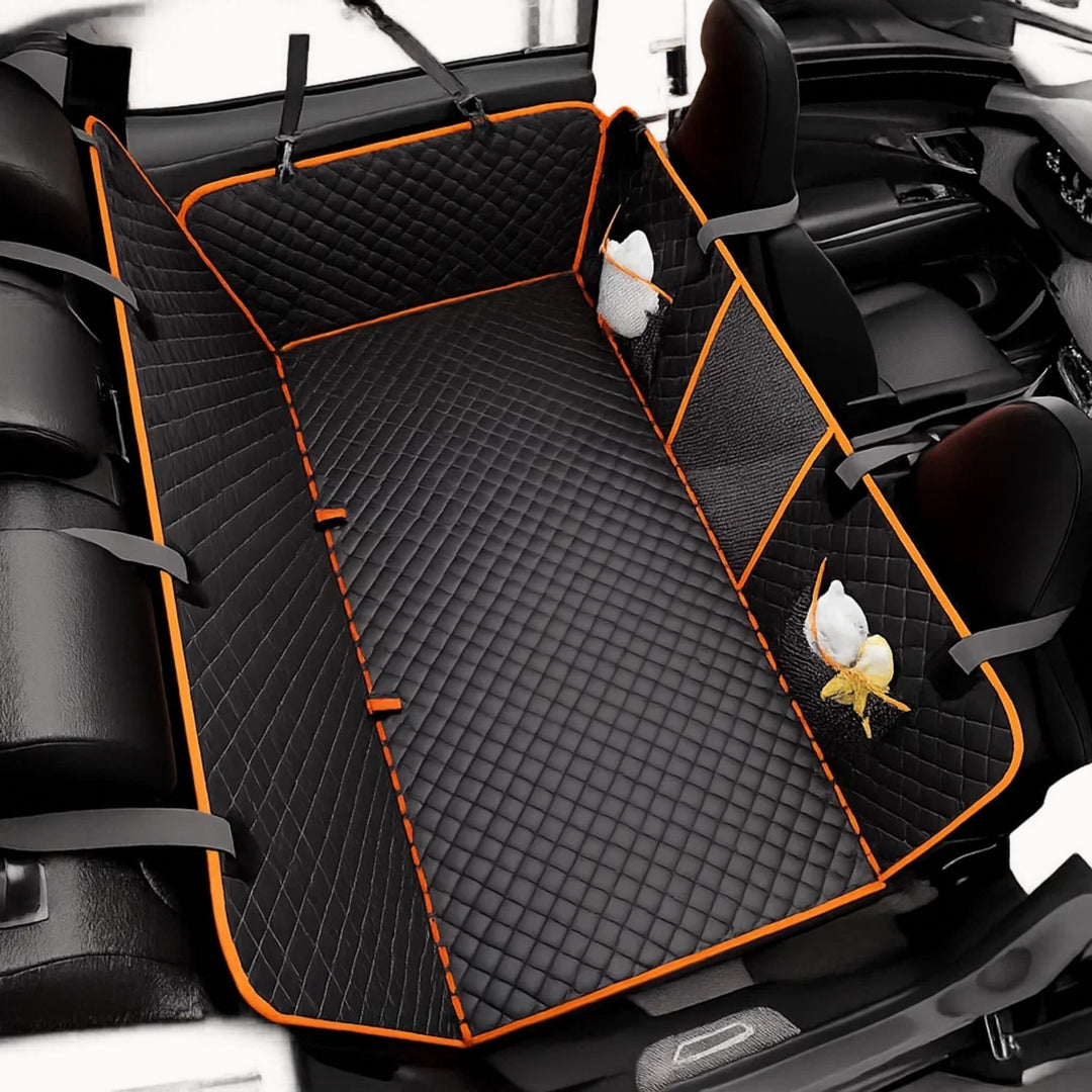 Black dog back seat extender detail showing mesh storage pockets and straps