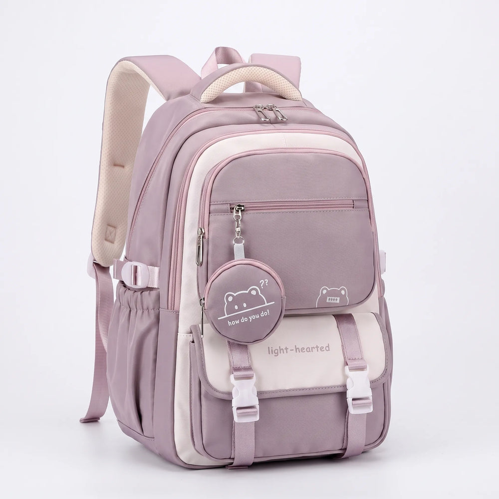 Lavender and cream backpack at a three-quarter angle on a plain background, with padded straps, side pocket and bear pouch charm. 2