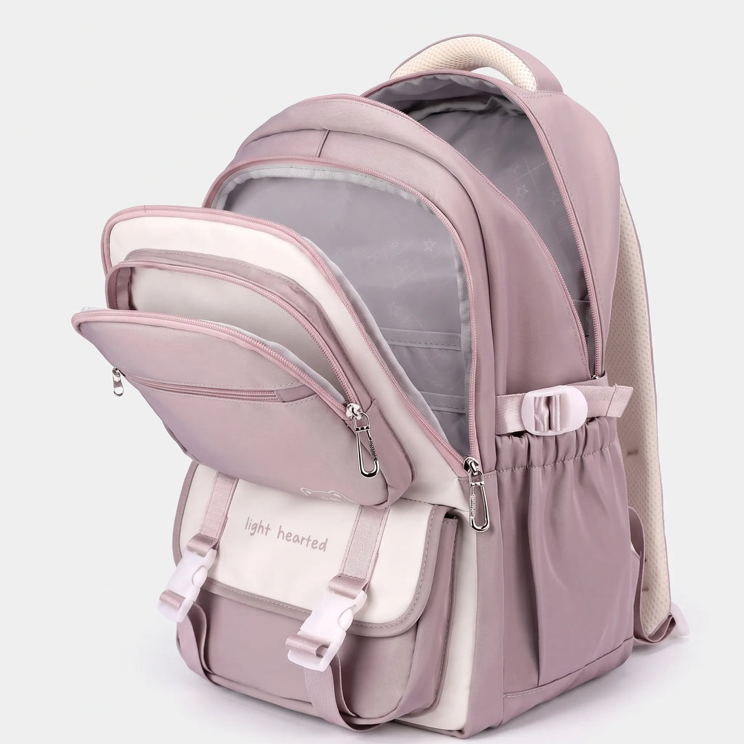 Backpack with the front compartments unzipped to show the layered pockets and the gray star-patterned lining of the main section. 3