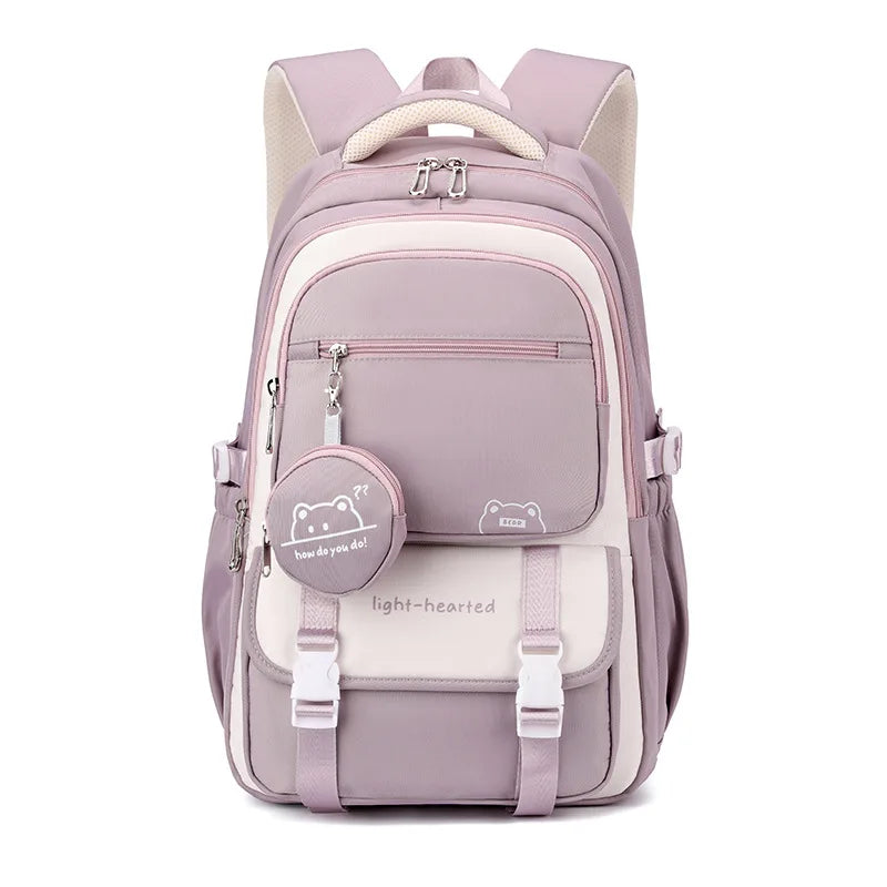 Front view of the lavender and cream backpack with bear charm pouch, double buckle flap pocket and padded shoulder straps. 6