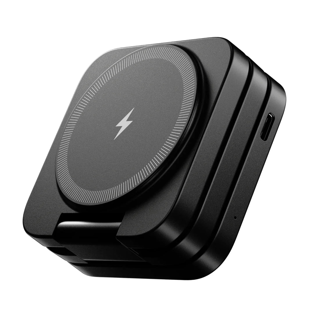 Black foldable magnetic wireless charging station folded into a compact square block with a USB-C port on the side.
