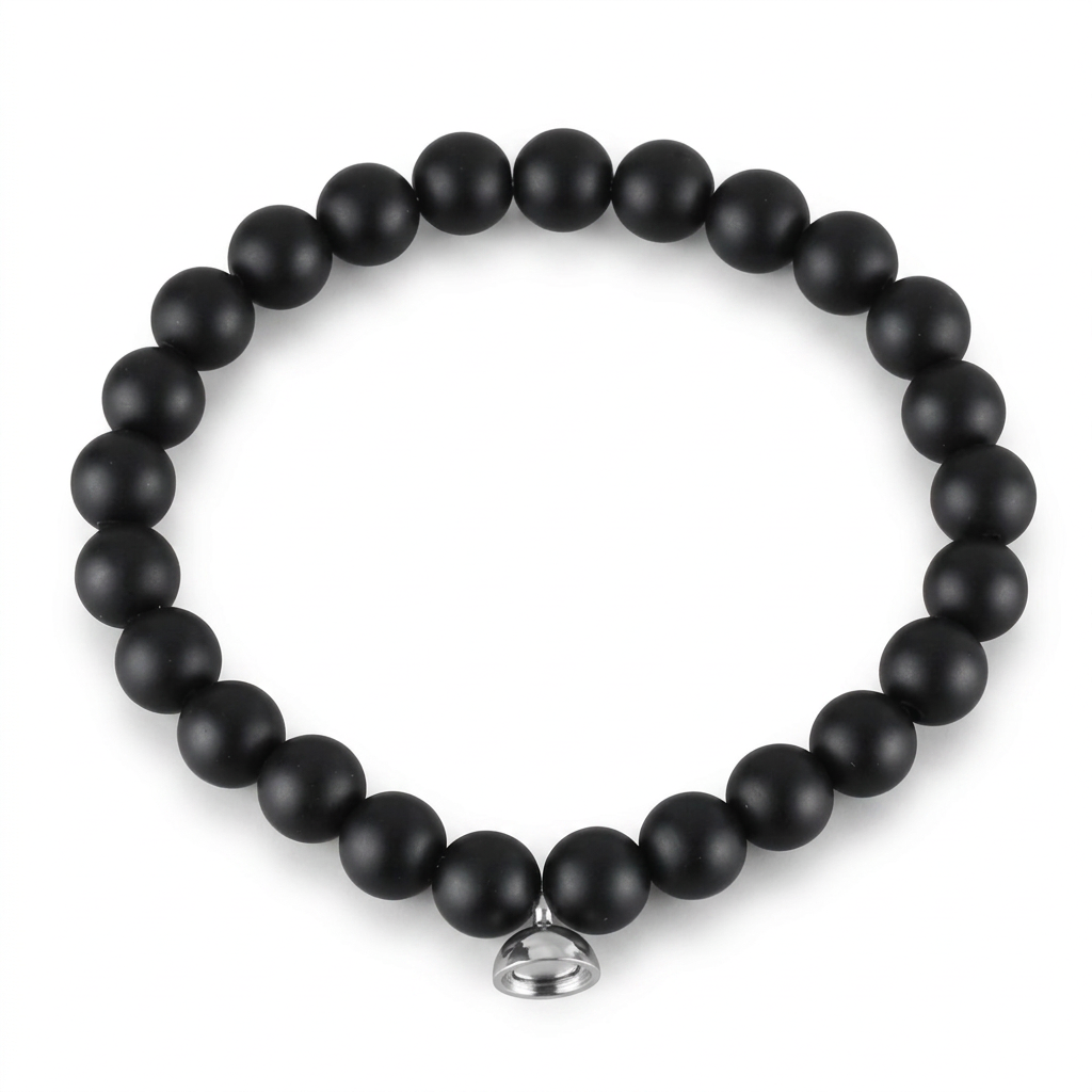 Matte black bead bracelet with a silver magnetic charm on a clean white background 5