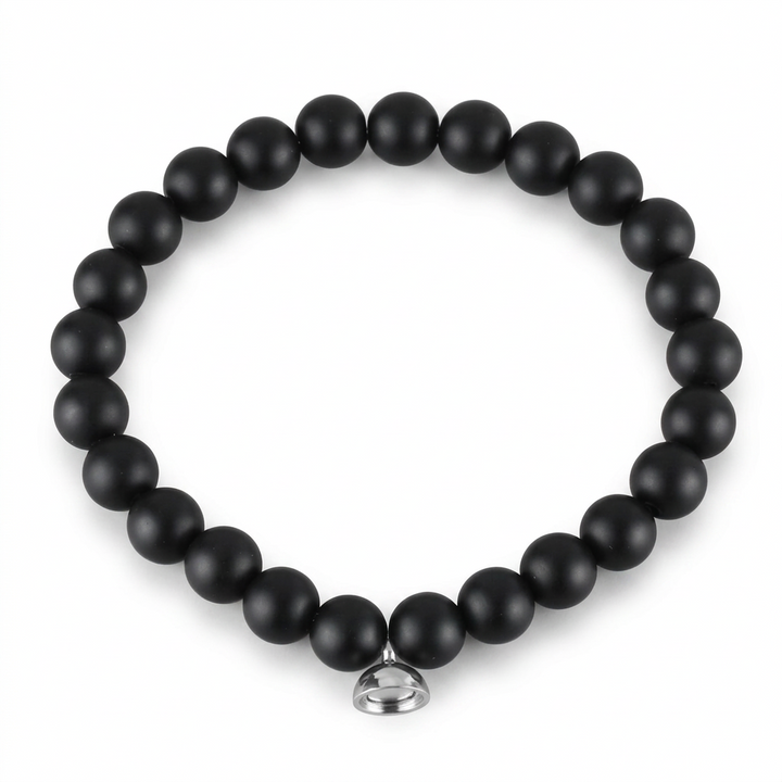 Matte black bead bracelet with a silver magnetic charm on a clean white background 5