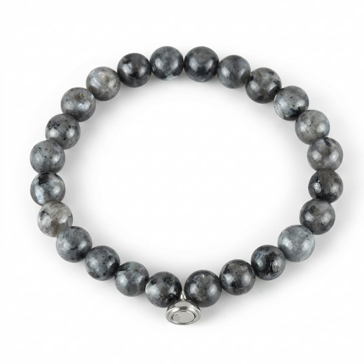 Glossy gray and black speckled bead bracelet with a silver magnetic charm on a white background 7