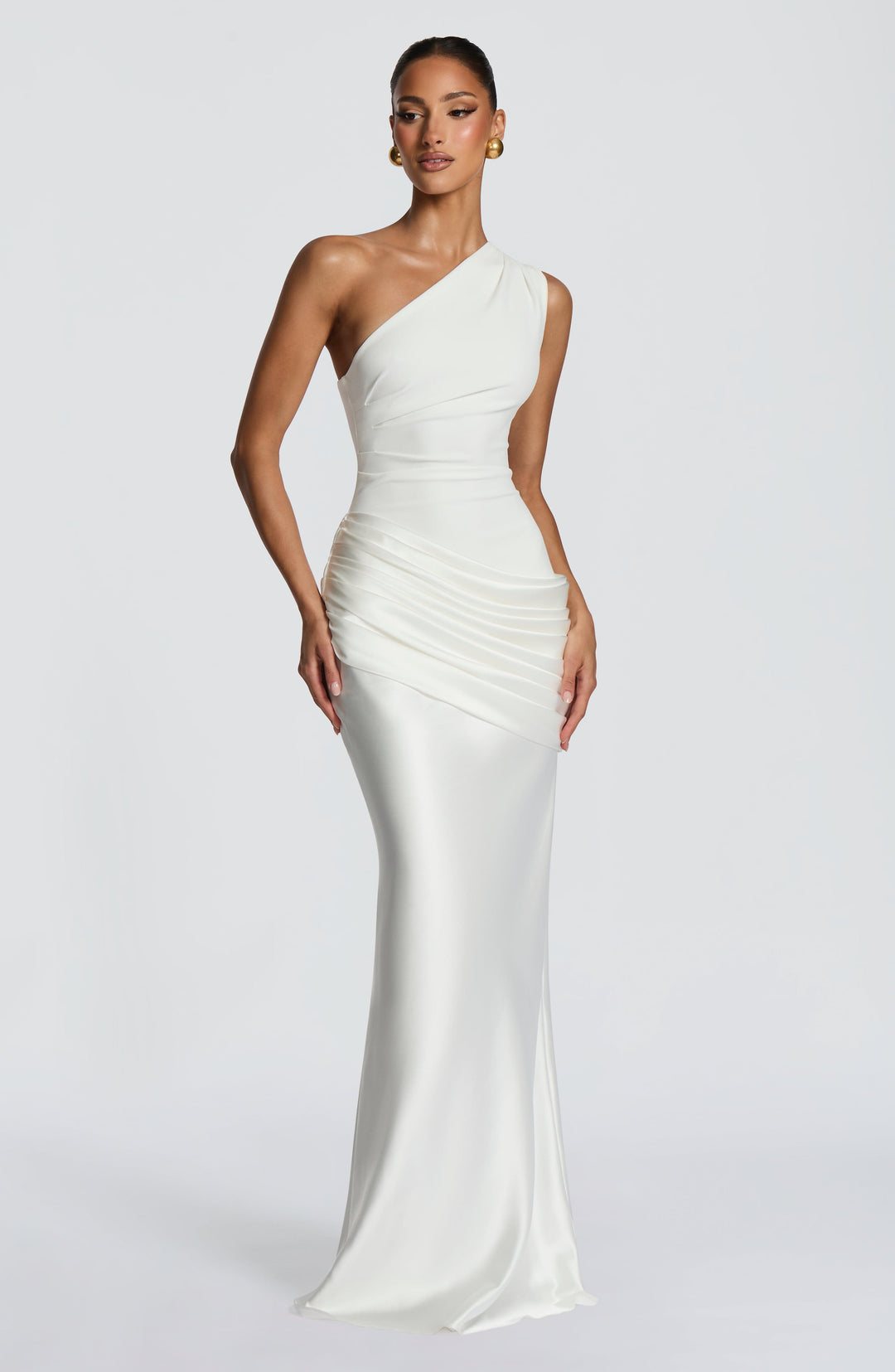 Front view of the ivory satin maxi dress, model posed with arms at her sides, showing the full-length skirt and train. 26